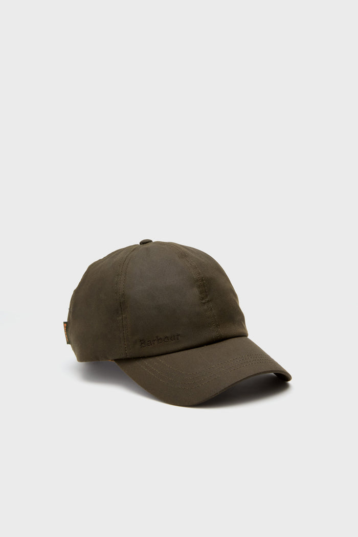 A Barbour waxed cotton cap in olive green features visible stitching and a classic peaked design.