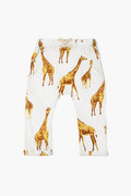 Milkbarn children's jogger pants in white, featuring a soft fabric and an all-over yellow and brown giraffe print for cozy comfort.