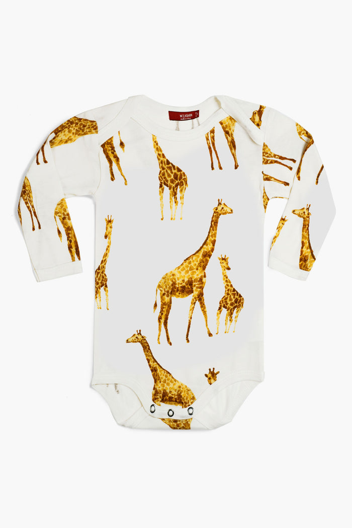 Milkbarn white bamboo long sleeve one piece baby outfit, decorated with charming orange giraffes in different poses and sizes.