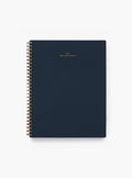 An APPOINTED navy blue cotton-blend bookcloth 2023 yearly task planner with gold cover lettering is centered.