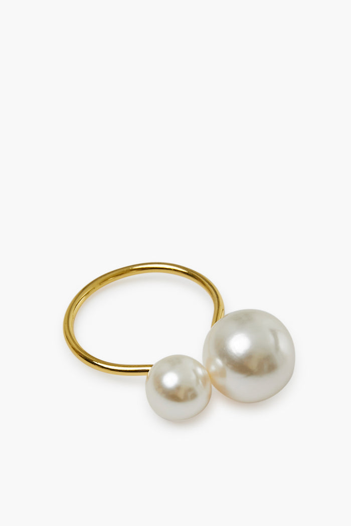 The Chefanie gold ring features two white pearls of different sizes, making it an elegant napkin ring for your holiday table or a thoughtful hostess gift.