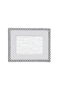 The Mariposa rectangular silver recycled aluminum frame features a beaded border and textured inner section, handcrafted for 4x6 photos—an ideal housewarming gift.