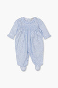 Light blue long-sleeve floral footie onesie by kissy kissy, crafted from soft Pima cotton with a smocked bodice, enclosed feet, and delicate floral pattern.