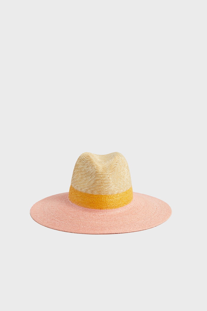 Wyeth wide-brim wheat straw hat featuring a natural crown, yellow band, and pink brim.