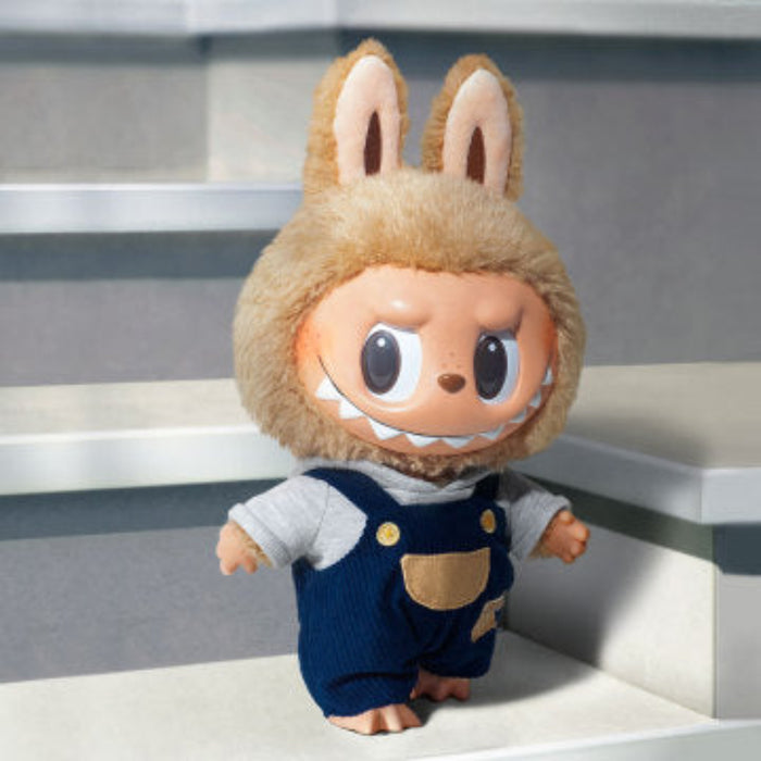 Pop Mart Labubu Time to Chill plush doll — side view in denim dungarees and pastel blue shirt