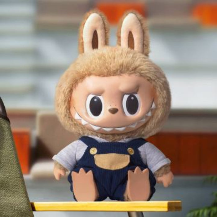 Pop Mart Labubu Time to Chill doll — close-up of toothy grin and mischievous eyes