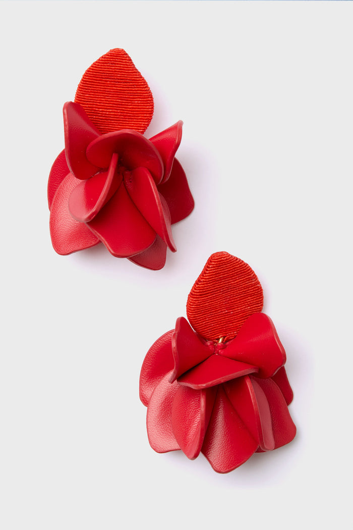 Tuckernuck Jewelry’s Orchid Earrings feature a bright red, petal-shaped, layered design with fabric backing—an eye-catching statement accessory.