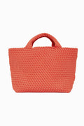 A stylish Naghedi medium tote in coral with woven design and two short handles, perfect for carrying your essentials.