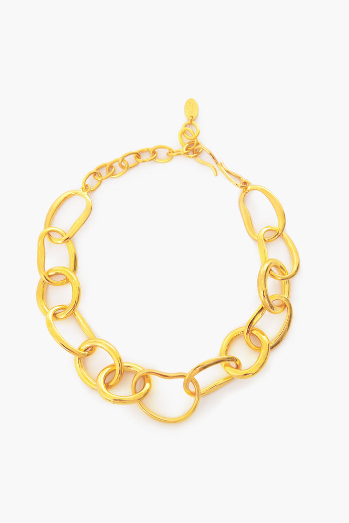 The Lizzie Fortunato gold-plated large link necklace features oval links and a lobster clasp, offering adjustable, versatile styling.