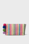 BTB rectangular clutch featuring multicolored vertical rainbow stripes and four yarn pom-poms on one side, perfect for a boho-chic look.