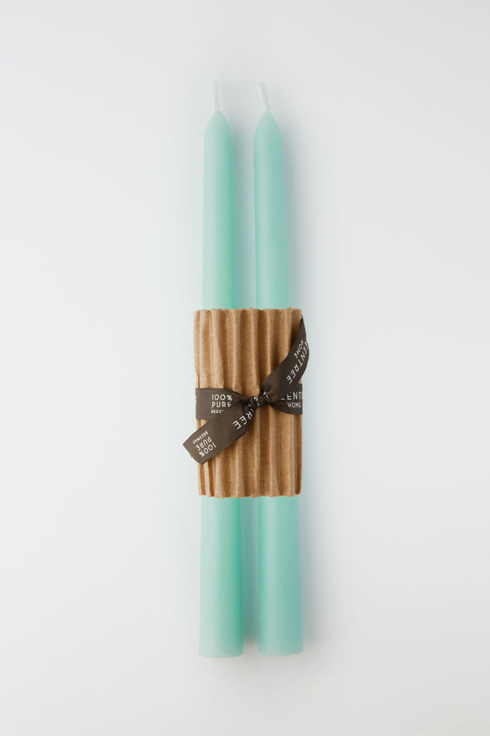Two Greentree Home Robins Egg Blue hand-poured candles are bundled together with a corrugated cardboard sleeve and finished with a brown ribbon.