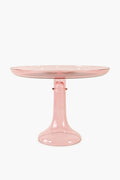 The Estelle Colored Glass pink cake stand features a wide, flat top and sturdy flared base, highlighting the elegance of luxury hand-blown colored glassware.