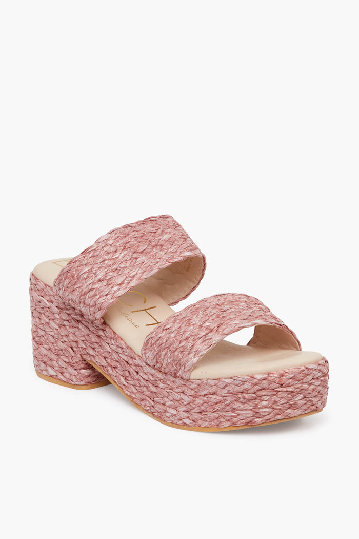 The Matisse pink braided raffia platform sandal features two wide straps, a chunky block heel, and a cushioned footbed, shown at a three-quarter angle.