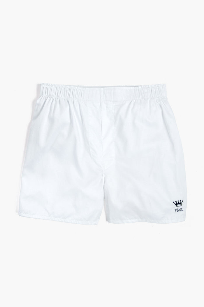 A pair of soft Pima cotton Royal Highnies men's boxer shorts, featuring an elastic waistband and a small crown logo above the letters RML on the lower left leg.