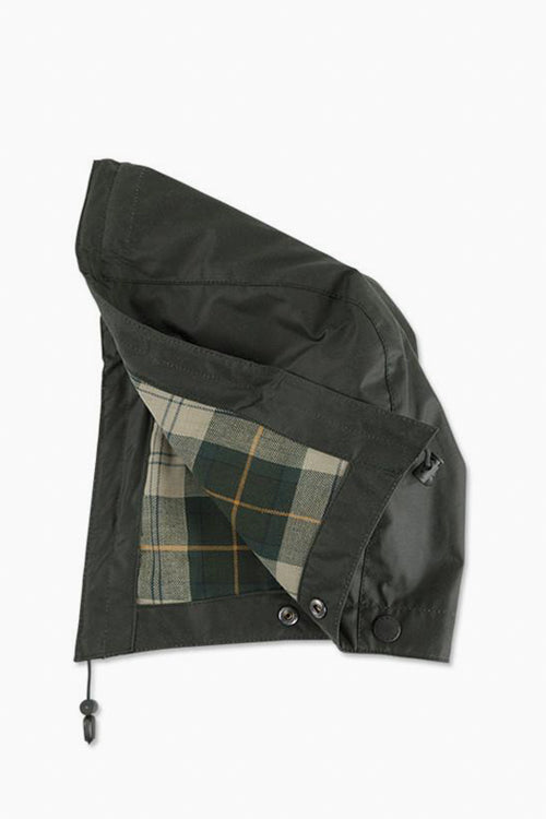 A detachable Barbour dark green waxed cotton hood with a plaid lining and adjustable drawstrings, designed to pair with Bedale or Beadnell jackets.