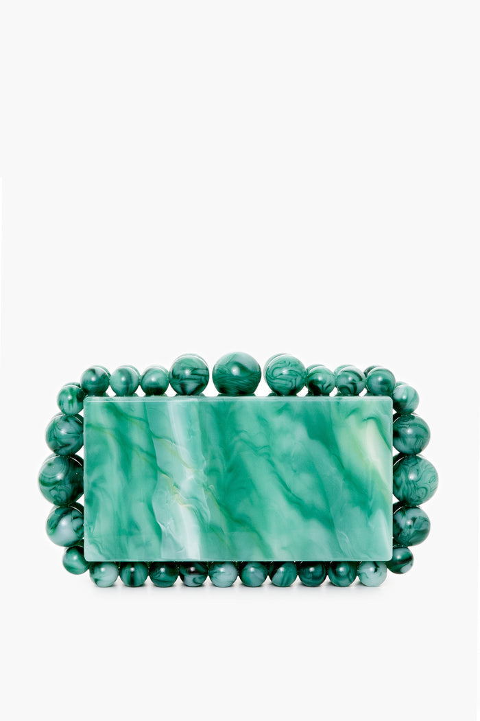A rectangular green marbled box clutch by Cult Gaia, accented with a border of round acrylic pearl beads.