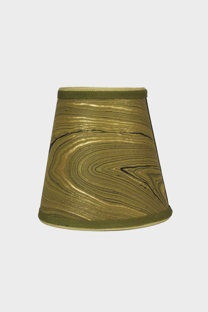 A gold and black marbleized paper lamp shade from Maison Maison Design adds Italian flair to your Zafferano Poldina Pro Lamp.