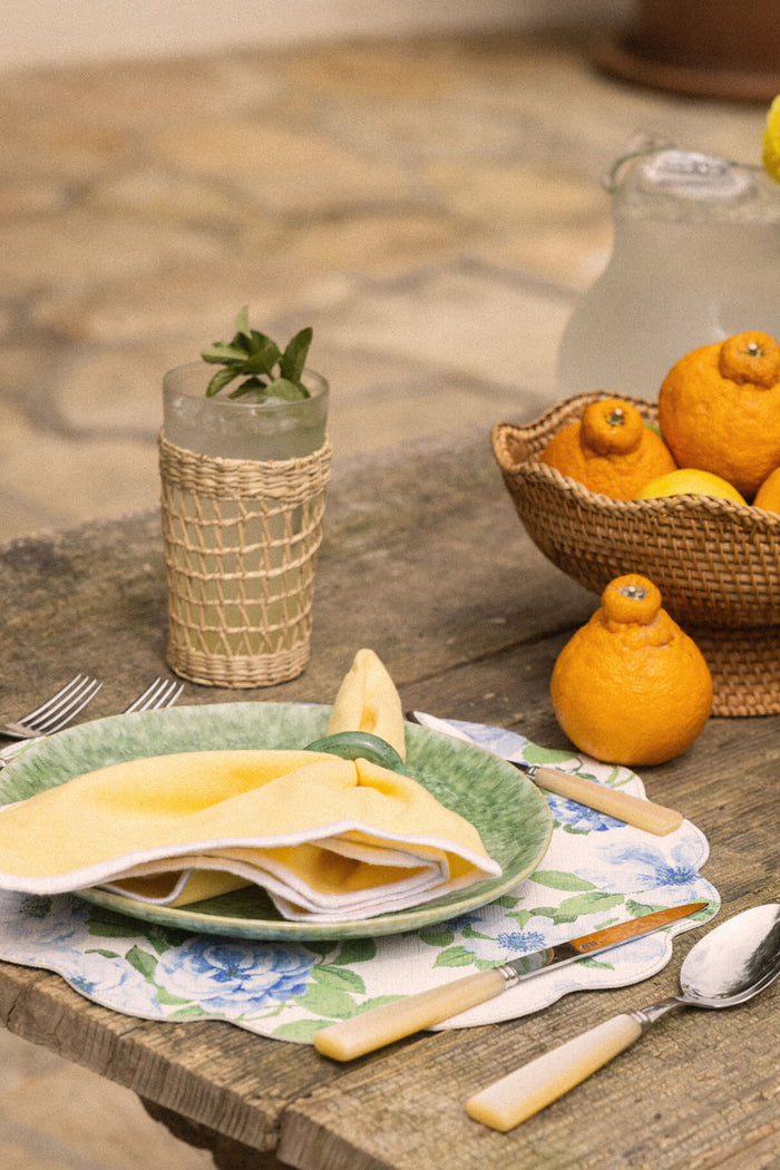Seagrass Cage Highball Set of 6, showcasing classic woven details, complements an effortless, high-end outdoor dining scene with rustic charm. Perfect for fun, stylish entertaining.