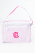 The Caton's Wharf Seersucker Lunch Box features pink and white stripes, a handle, two zippers, and AGL initials embroidered on the front.