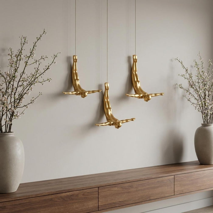 Set of Three Gold Resin Diving Man Hanging Dimensional Sculpture
