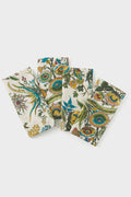 Set of 4 cotton napkins by Tuckernuck Home, featuring a colorful floral and botanical print in a staggered layout. Perfect as stylish table linens for any occasion.