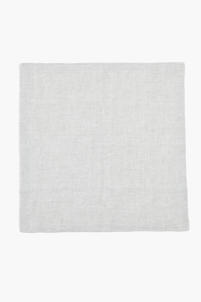 Stone Washed Linen Napkins, a classic, light-grey woven fabric piece, embody effortless elegance. Perfect for any meal, these high-end, hand-sewn napkins add fun sophistication.
