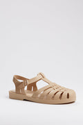 Melissa beige jelly sandal with closed toe, woven design, adjustable buckle strap, and flat sole—a stylish and iconic choice for sustainable fashion enthusiasts.