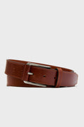 The Trafalgar brown men's leather belt features a silver rectangular buckle and coiled design, highlighting its genuine leather craftsmanship—a premium accessory for any wardrobe.