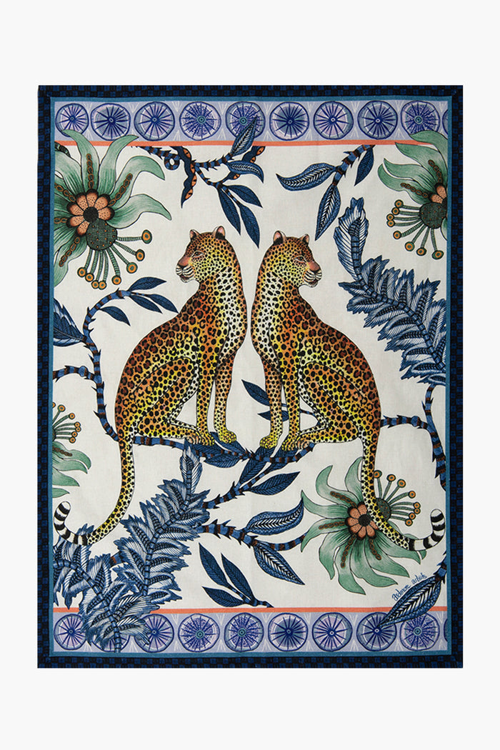 Illustration of two leopards sitting back to back among blue leaves, flowers, and decorative borders. Inspired by Ardmore Design, this pattern is perfect for a leopard tea towel or cotton kitchen accessory.