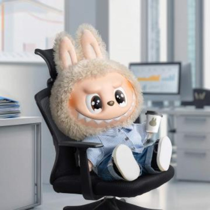 The Monsters Flip With Me plush doll — side view showing tan fur and rabbit ears