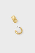 Tuckernuck Jewelry offers a pair of small, gold-tone ridged hoop earrings designed as hypoallergenic accessories for sensitive ears.