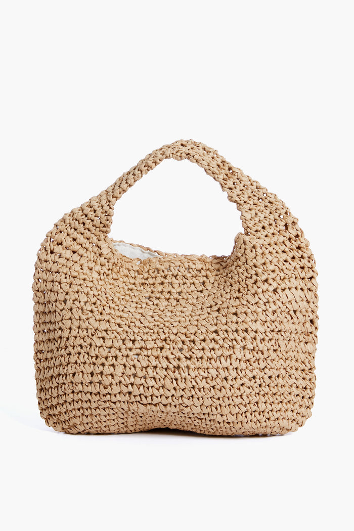The Hat Attack Woven Paper Straw Mini Slouch Bag features a rounded shape and a single handle.