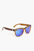 Sunski Tortoise Blue Madronas sunglasses feature a brown tortoiseshell frame and blue mirrored polarized lenses with 100% UV protection.