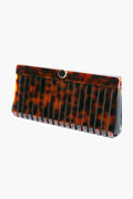 Cult Gaia rectangular faux tortoise clutch featuring a glossy tortoiseshell pattern, vertical black stripes, and a small round metal clasp at the top.