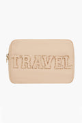 Stoney Clover Lane beige large pouch with zipper, featuring bold, textured "TRAVEL" letters—ideal for organizing your travel accessories.