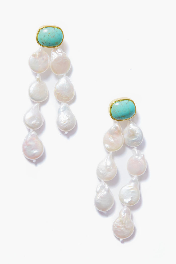 A pair of turquoise earrings by Lizzie Fortunato with gold settings and clusters of irregular freshwater pearls.