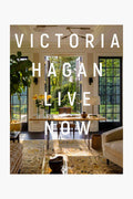 A stylish living room with elegant decor showcases Rizzoli home style; overlaid text reads RIZZOLI LIVE NOW.