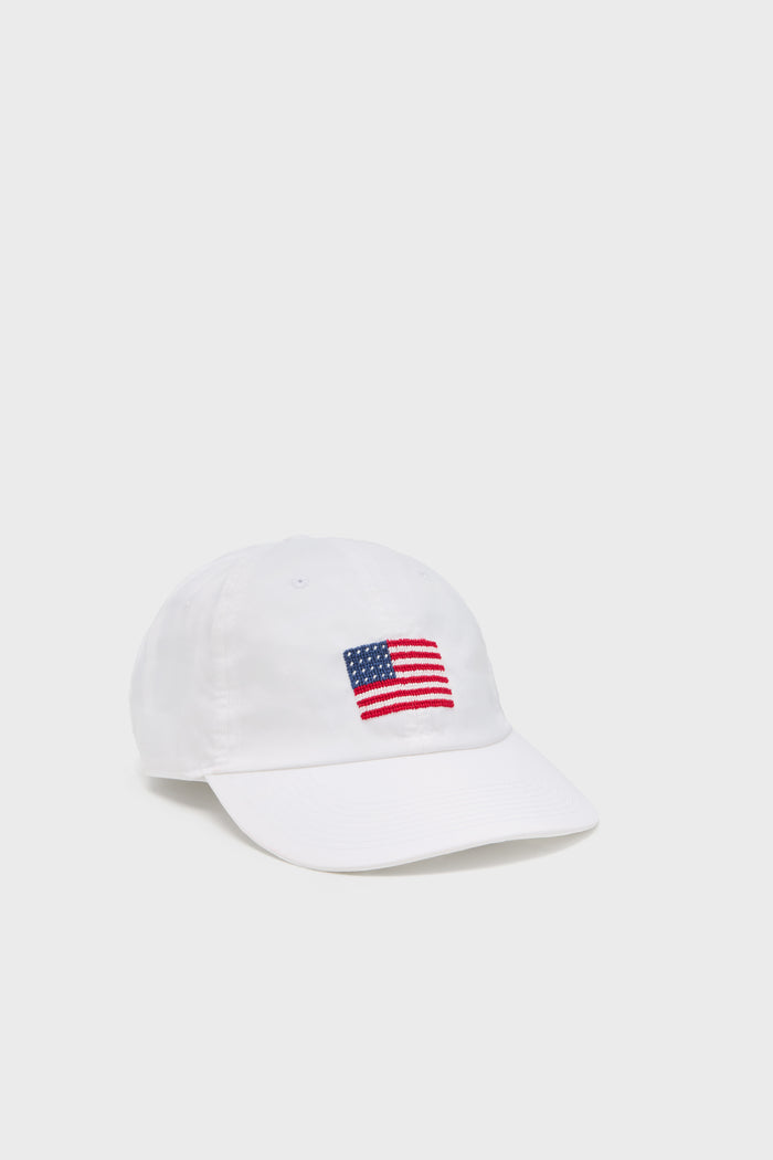 Smathers and Branson white baseball cap with an embroidered American flag on the front, ideal as a patriotic or performance hat.