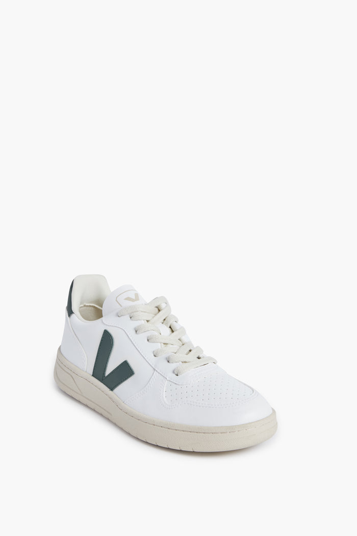 VEJA V-10 sneakers featuring a white upper, off-white sole, perforated toe, and a dark green V logo—crafted as sustainable footwear.