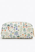 A small rectangular cream cosmetic pouch with a zipper, decorated with Rifle Paper Co.'s hand-painted multicolored florals.