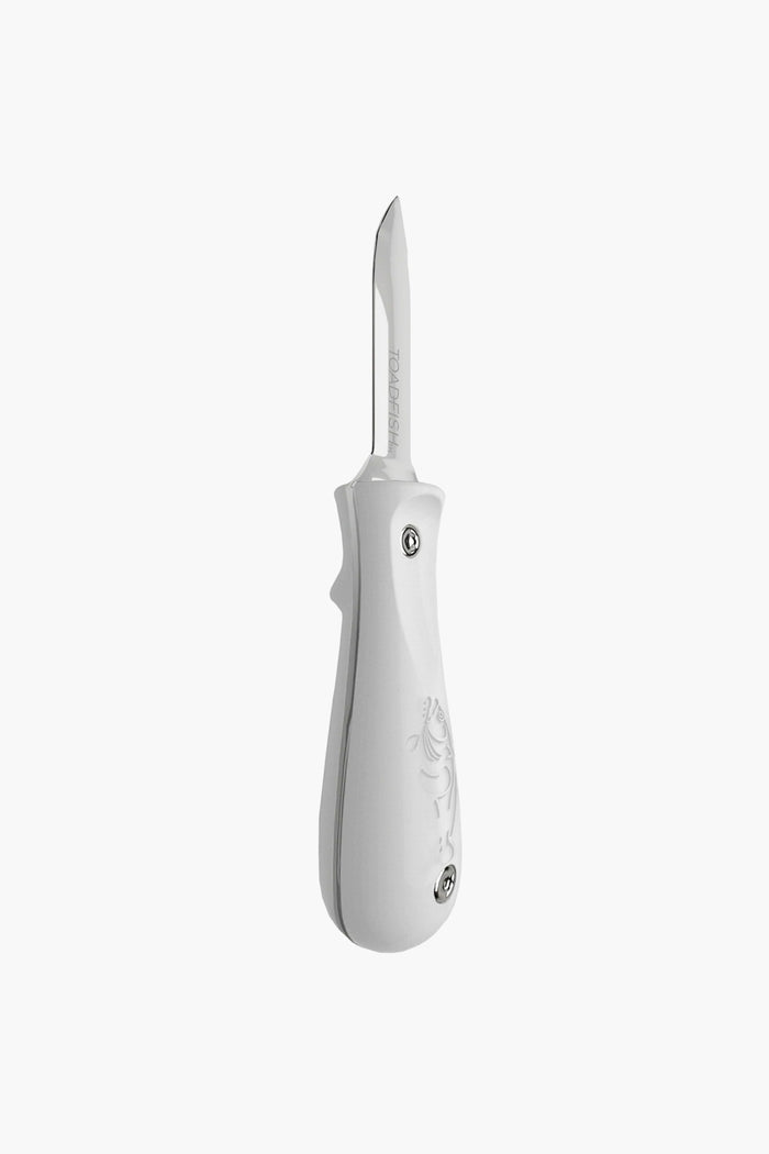 The Toadfish commercial oyster knife features a white handle and a pointed stainless steel blade, making it ideal for professional shucking.