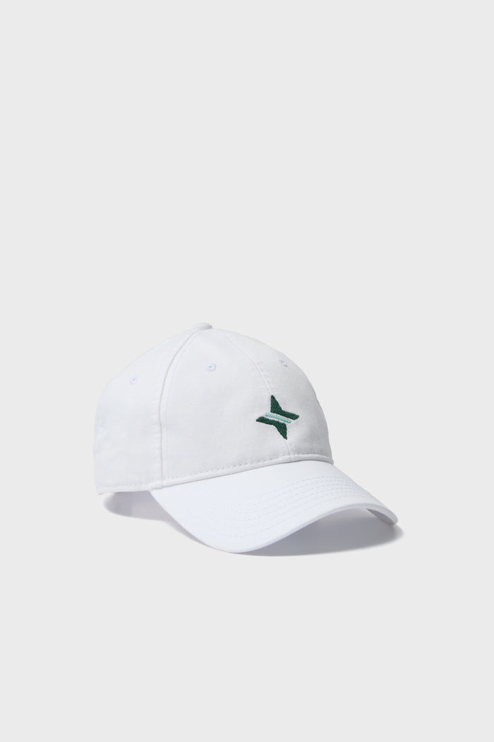 The Harding-Lane white pre-washed cotton hat has a small green embroidered star-like design on the front, combining classic style and comfort.