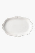 Juliska's empty, white oval ceramic stoneware platter features a scalloped edge and subtle embossed detailing—perfect for adding elegance to your dinnerware collection.