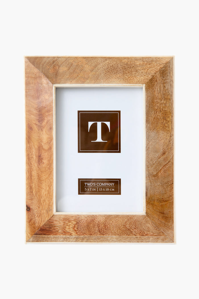 A unique mango wood frame by Two's Company, featuring a wide border, a placeholder image with the letter T, and frame size details: 5 x 7 in | 13 x 18 cm.